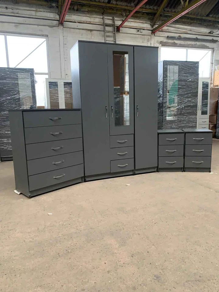 Premium 4-Piece Grey Bedroom Furniture Set – 3-Door Mirrored Wardrobe, 5-Drawer Chest, and Two 3-Drawer Bedside Tables
